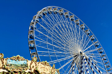 Giant Ferris Wheel ride on Pierre Lataillade Pier in the seaside resort of Arcachon, France