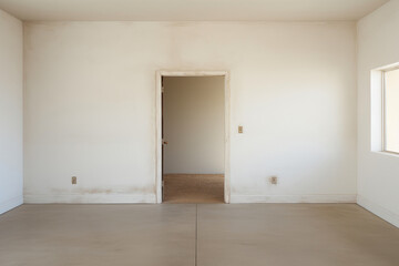 Empty Threshold: A White Door in Isolation