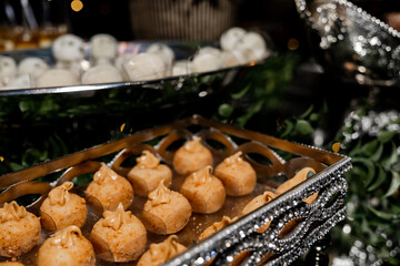 Elegant Wedding Dessert Table with Delicious Sweets and Treats