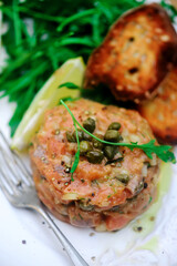 Salmon tartare ,toast with glass of wine