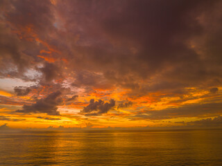 Fototapeta na wymiar .aerial view amazing sky in sunset above the ocean at Karon beach Phuket..Imagine a fantasy bright yellow clouds changing in colorful sky..Gradient color. Sky texture, abstract nature background.