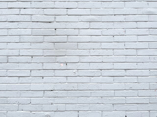 Brick wall painted with white paint.