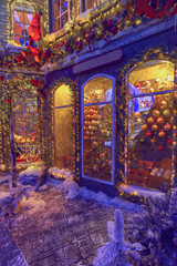 The windows of the old town are decorated for Christmas with garlands.