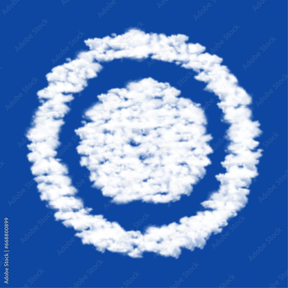 Poster clouds in the shape of a radio button symbol on a blue sky background. a symbol consisting of clouds
