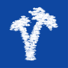 Clouds in the shape of a palm trees symbol on a blue sky background. A symbol consisting of clouds in the center. Vector illustration on blue background
