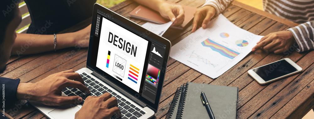 Aufkleber graphic designer software for modern design of web page and commercial ads showing on the computer s