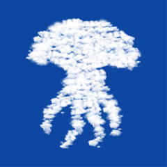 Clouds in the shape of a jellyfish symbol on a blue sky background. A symbol consisting of clouds in the center. Vector illustration on blue background