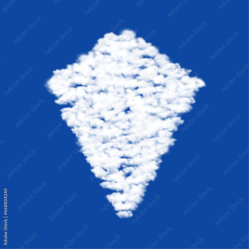 Poster clouds in the shape of a kite symbol on a blue sky background. a symbol consisting of clouds in the 