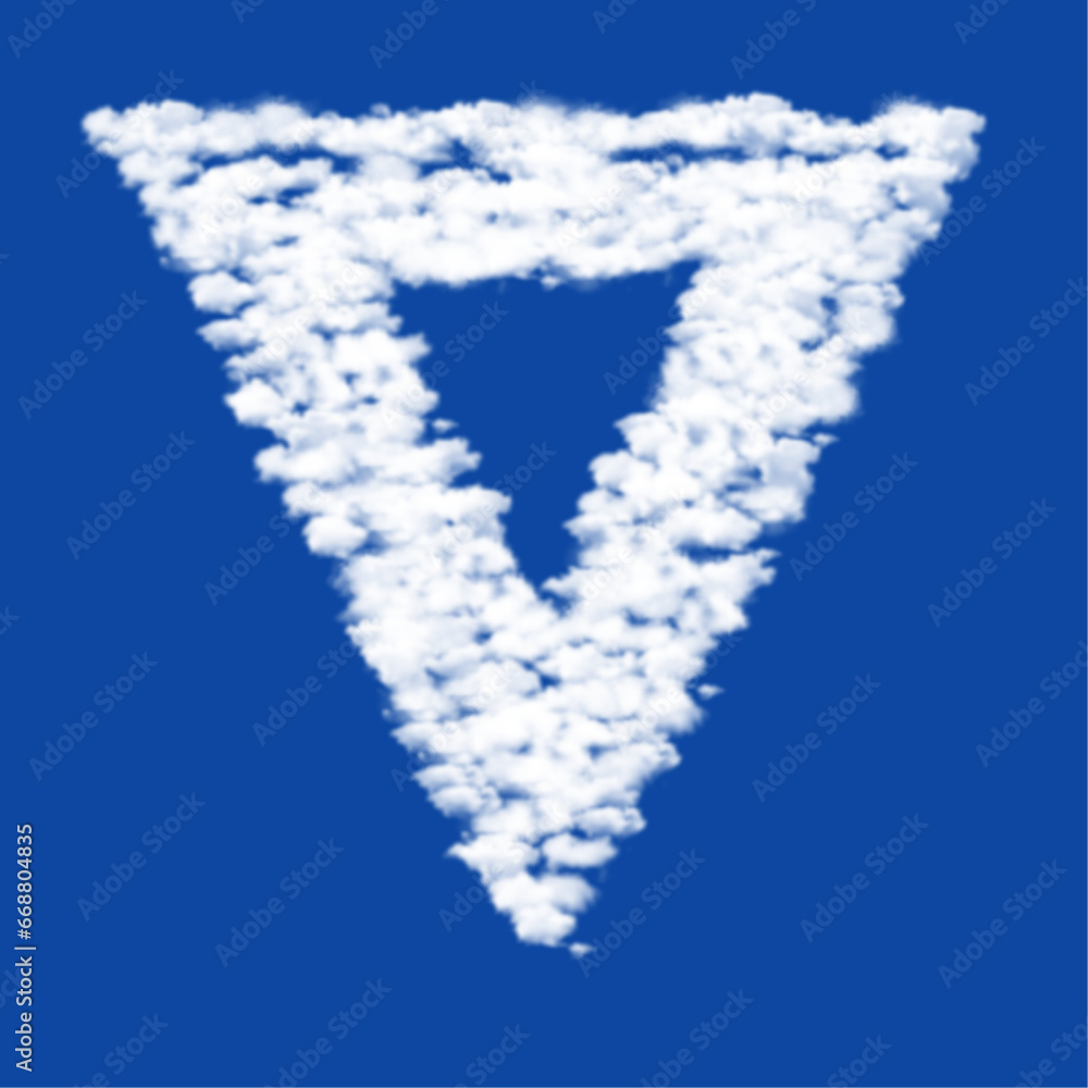 Poster clouds in the shape of a give way sign on a blue sky background. a symbol consisting of clouds in th