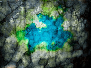 Concrete wall textured of rough and cracked with vibrant color.  Grunge background with copy space