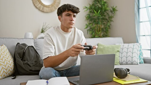 Confident young hispanic teenager, an avid gamer, indulging in an epic online video game at home, sitting comfortably on the sofa, with joystick in hand, celebrating every win!