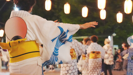 People dance of Bon Odori at night