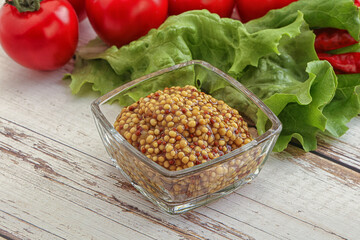 Mustard seeds sauce in the bowl