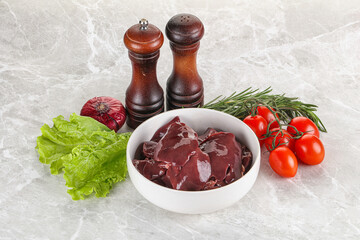 Raw turkey liver in a bowl ready for cooking