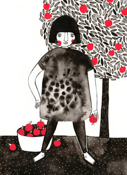 Girl standing in front of an apple tree