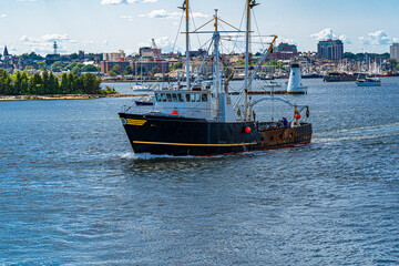 A fishing boat leaving New Bedford harbor
