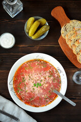 still life with red borscht, bread and a glass of vodka