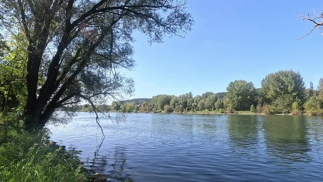 Danube river in autumn with clear clean blue water in sunshine in Bavaria