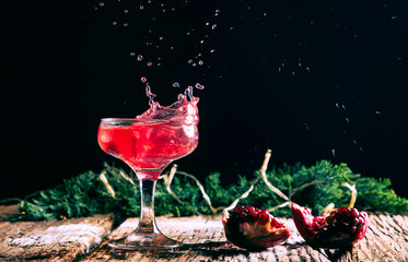splashing cocktail and fireworks for New Year