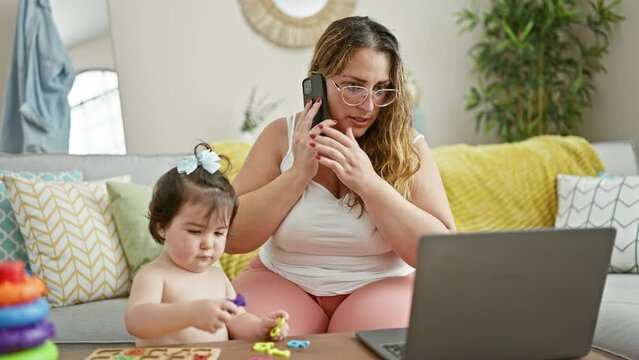 In the embrace of home, mother and daughter play a serious game of maths on the sofa, balancing family love with work amid the world of telework.