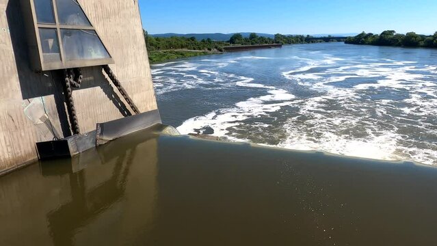 Strong current in the Danube river after opening the overflow at a lock and hydroelectric power station