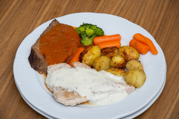 Pork steak with carrots and broccoli