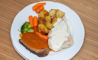 Pork steak with carrots and broccoli