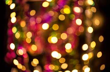 Abstract festive elegant background of blurred with bokeh lights and stars texture