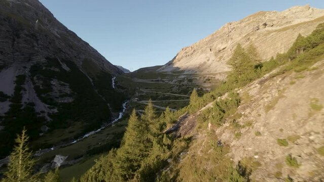 areal footage of apls in switzerland and italy in front of road 