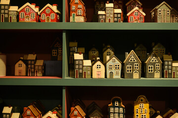 souvenir multi-colored European ceramic houses on store shelves
