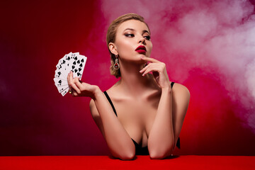 Photo of attractive seductive woman wear dress playing black jack look empty space isolated red...