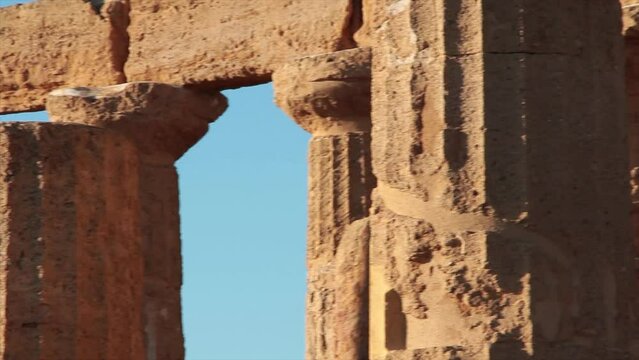 agrigento sicily italy ancient temple of juno pillars close up pan right to left