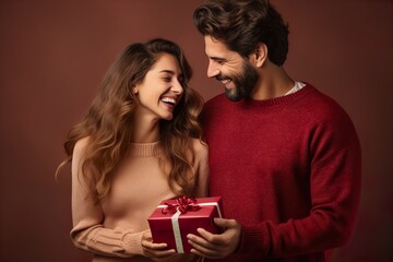 Dreamy excited married couple wear ornament sweaters isolated on color background