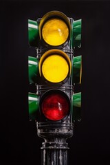 a traffic light with black background