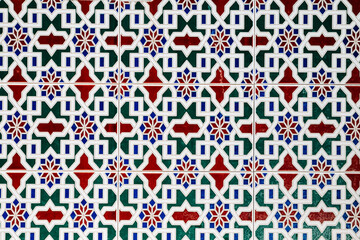 Vibrant geometric pattern in mediterranean style on wall tiles in Marbella, Spain