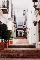 Fototapeta na wymiar City view on cozy street in Marbella, Spain. 