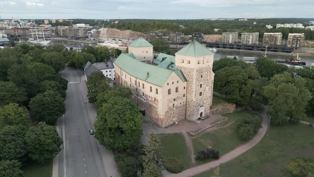Establishing aerial video of Turku Castle, a medieval stone structure and an important landmark of Turku, Finland