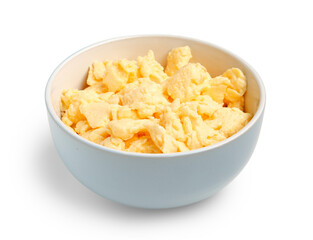 Bowl of tasty scrambled eggs on white background