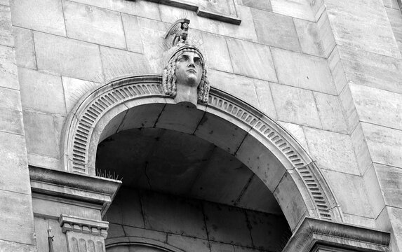 Female head as keystone on arch in Bucharest, Romania