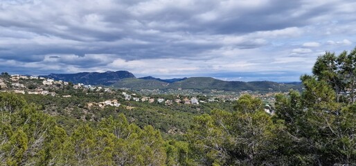 Fototapeta premium Cala de Egos, virgin beach of boulders located in the municipality of Andratx. Cala d'Egos beach is located on the rugged coast of the municipality of Andratx. It is a virgin beach with small boulders