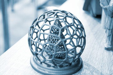 Art objects and prototype models printed on 3D printer from polyamide powder close-up. Technology...