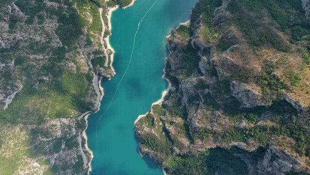 Aerial top view of Beautiful Piva river canyon with reservoir Piva Lake (Pivsko Jezero) summer view in Montenegro. Nature travel background, 4k 