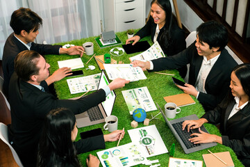 Diverse group of business people planning business marketing with environmental responsibility for...