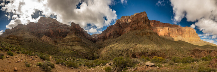 Puffy Clouds Loom Over Hermit Creek With Pima Point In The Distance