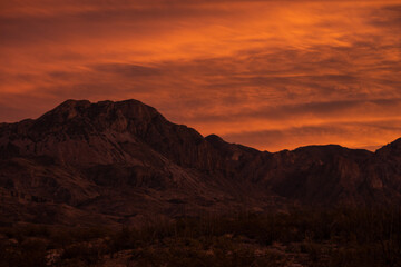 Fototapeta na wymiar Rows Of Clouds Resemble Waves At Sunset Over The Chisos Mountains In Big Bend