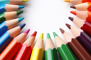 Fototapeta premium Colored pencils creatively arranged, captured in a close-up shot to highlight their intricate, vibrant hues and the artistic possibilities they hold.