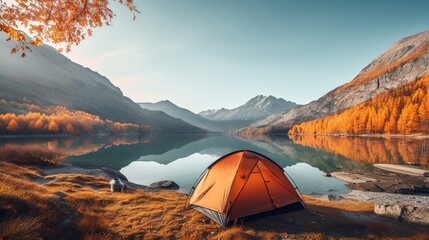 Camping tent on mountain lake in autumn in the morning - obrazy, fototapety, plakaty