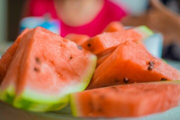 Red watermelon slices lying on the table. High quality photo