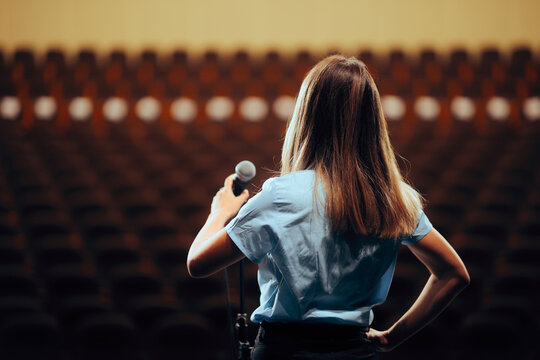 Businesswoman Preparing to Give a Public Speech Rehearsing it. Spokeswoman practicing alone before giving a public presentation 
