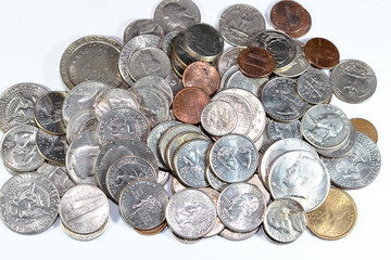 Pile of American coins of different times and values, 1 cents, dimes, quarters, half dollars, and dollars, vintage retro old United States of America coins, exchange rate, economy concept, USA coins